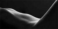 black & white framed prints of a nude female body